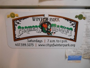 A large magnet of the Winter Park Farmers' Market logo from the early 90s, now on a refrigerator in the offices of Earl Wilson Tropic Decor in Apopka